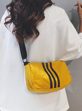 时尚条纹帆布包包女2025新款休闲通勤单肩包运动旅游骑行斜挎小包