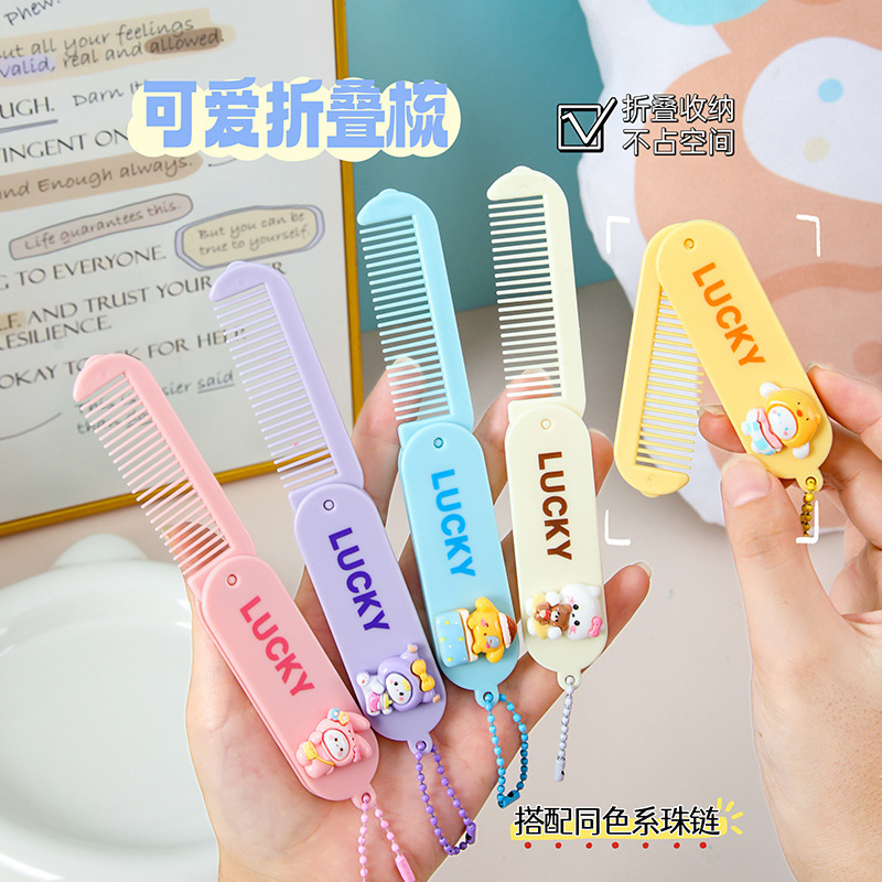 新款可爱迷你折叠梳女士专用长发家用美发梳学生便携塑料梳小梳子