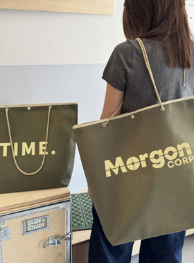 新款绿色礼品穿孔无纺布手提袋子服装店大容量包装袋购物袋礼物袋