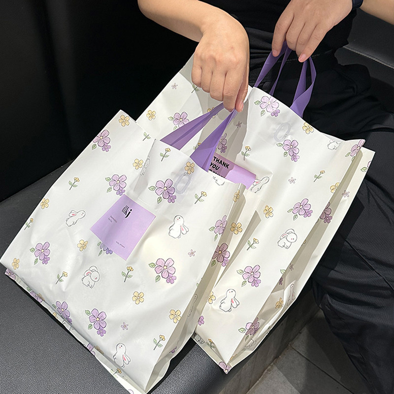 花间兔兔磨砂服装店手提袋礼品袋塑料袋包装袋女装店购物袋胶袋