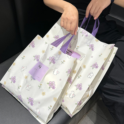 花间兔兔磨砂服装店手提袋礼品袋