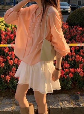 all over 26SS 东大门代购  温柔木耳边半开领系带长袖衬衫女早春