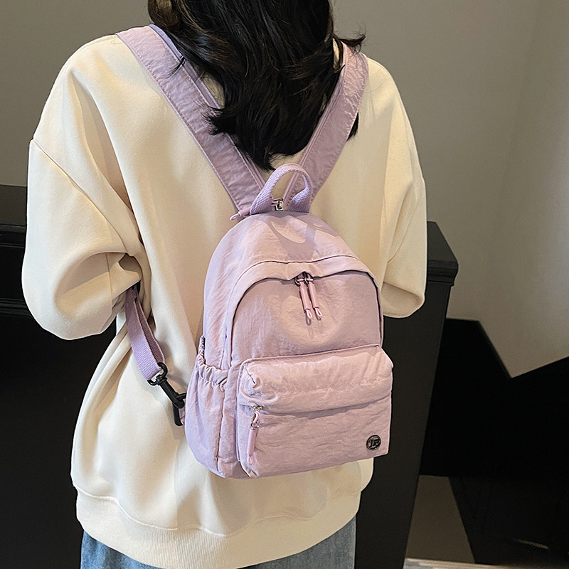 双肩斜挎两用包女2025新款轻便旅游小背包骑行帆布胸包运动登山包