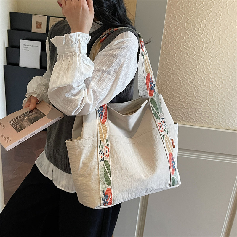 女士大容量出行包高级感帆布托特包 单肩百搭通勤包巨好看的包包