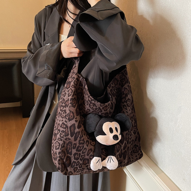 糜皮绒豹纹帆布包女2025新款韩版大容量手提通勤包单肩复古背包