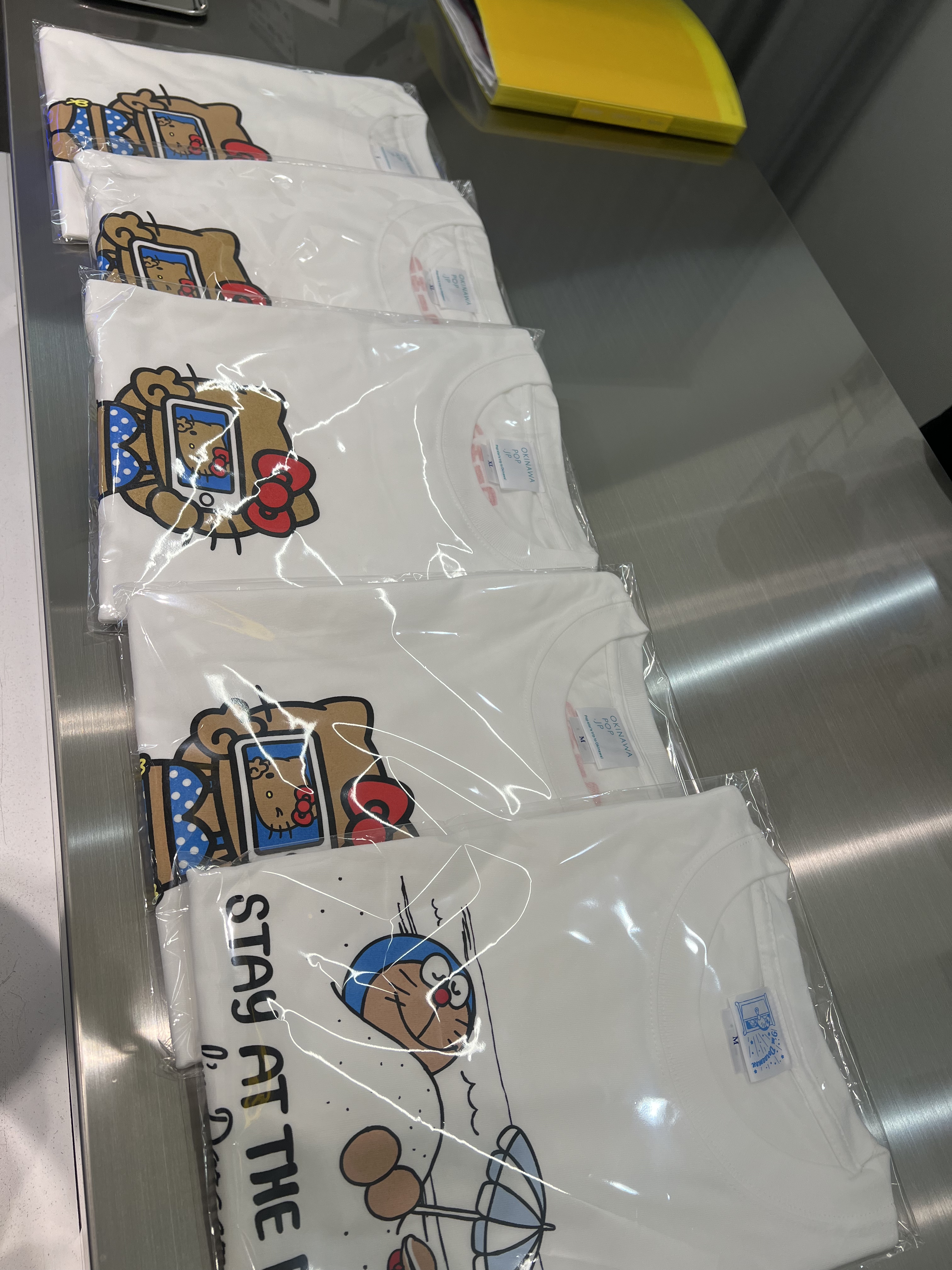 现货日本冲绳限定黑皮卡通Kit动漫T恤/鞋帽/服装