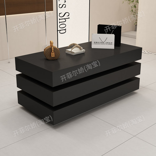 服装店中岛桌女装店铺中间流水台简约现代洞石纹展示桌鞋包中岛台