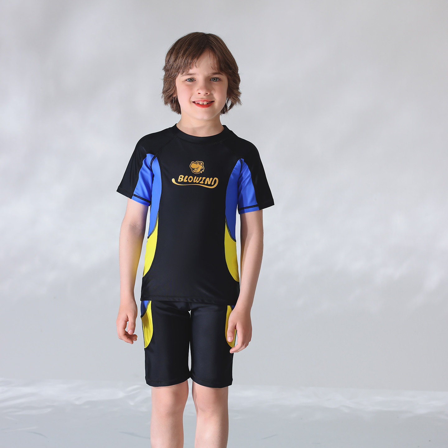 出口欧美单男中大童防晒防辐射短袖黑底拼彩块短裤休闲分体游泳衣