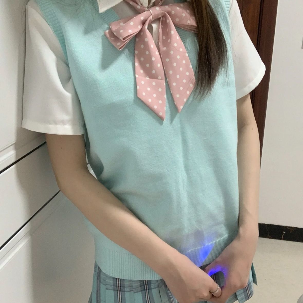 春秋季女校供感无袖针织毛衣背心