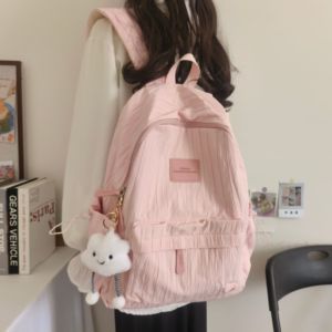 轻便书包女大学生小众设计感简约百搭双肩包中小学生休闲旅行背包