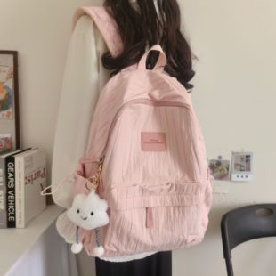 轻便书包女大学生小众设计感简约百搭双肩包中小学生休闲旅行背包