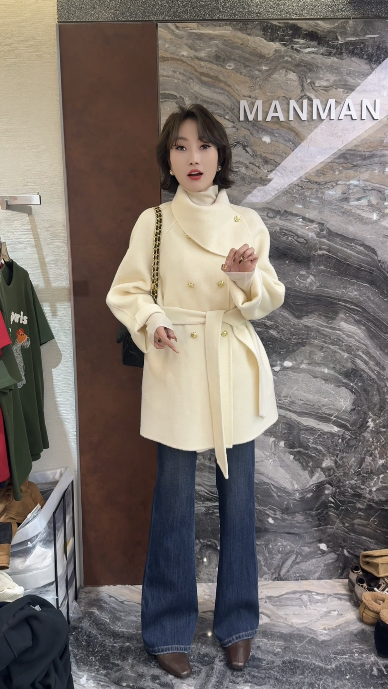 欧洲站2025冬季新款时尚翻领双排扣系带收腰轻熟风中长款女士大衣