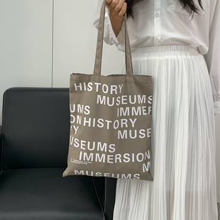 2024年字母原创英文个性 运动潮流帆布包大容量手提袋 街头欧美时尚