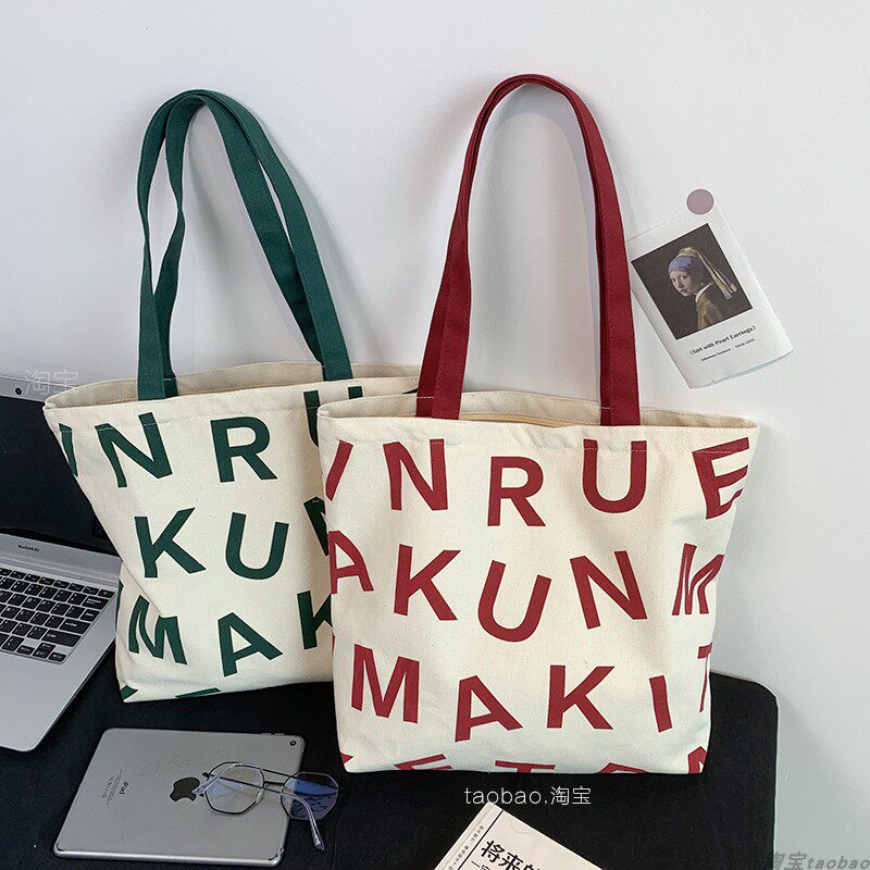 2026年字母街头流行百搭创意简约上学上班通勤帆布包大容量手提袋