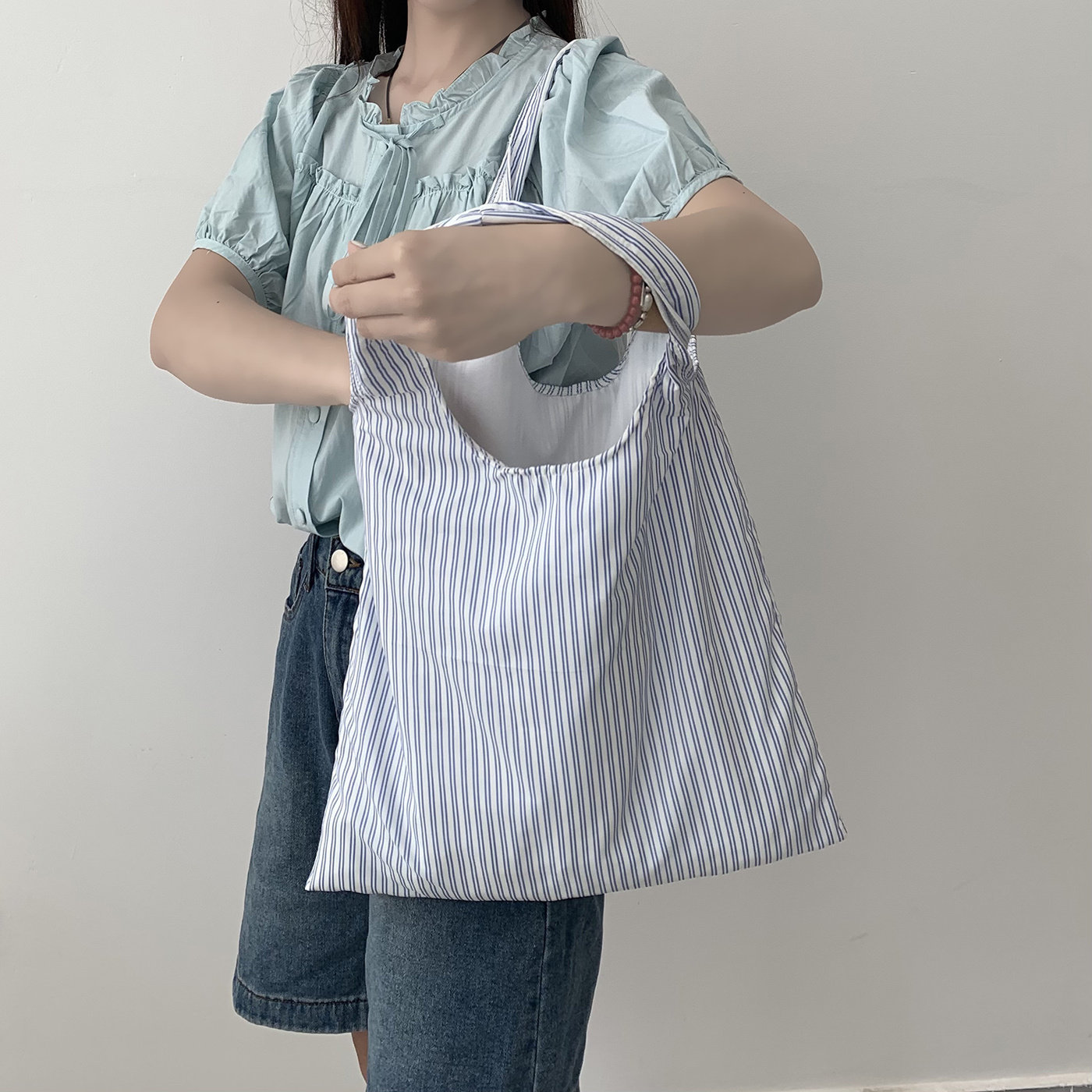 2026新款大容量条纹帆布包简约通勤休闲慵懒风韩系ins手提单肩包