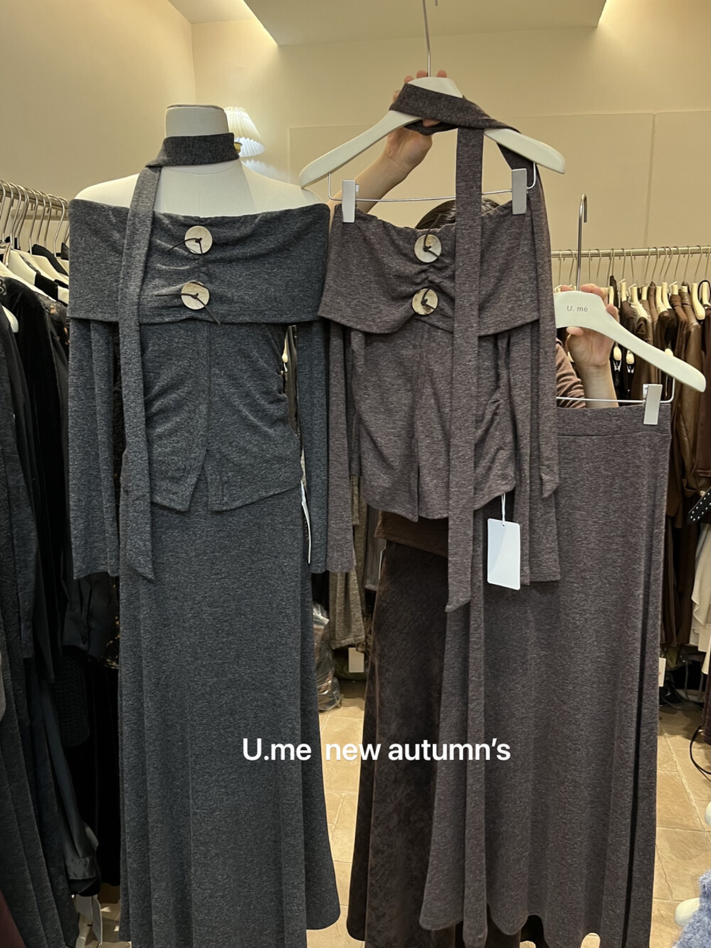 广州U.me2025秋装一字肩开叉不规则T恤上衣高腰半身裙套装