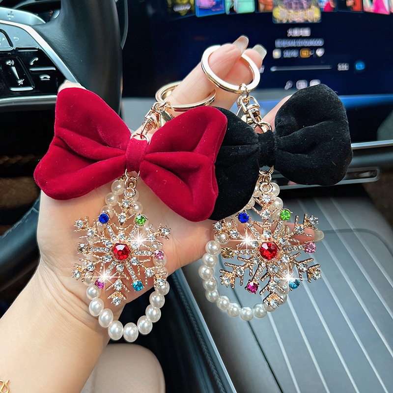 爆款圣诞节饰品配件创意百搭镶钻锌合金蝴蝶结圣诞雪花包挂件