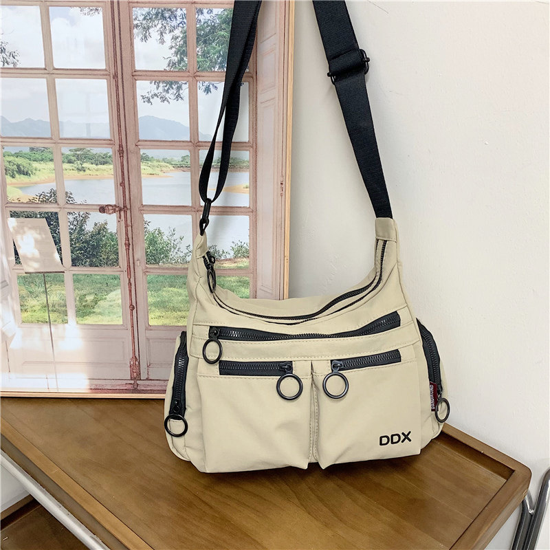 2025新款潮秋冬工装风帆布包男女同款单肩斜挎包轻便大容量休闲包,箱包皮具/热销女包/男包,时尚帆布包,淘宝优惠券,粉丝福利购,淘宝优惠卷