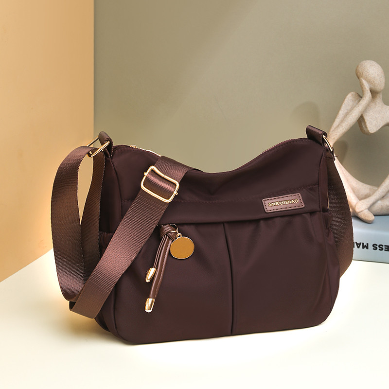 今年流行包包女2025新款潮秋冬百搭女士单肩斜挎包尼龙布包托特包,箱包皮具/热销女包/男包,时尚帆布包,淘宝优惠券,粉丝福利购,淘宝优惠卷