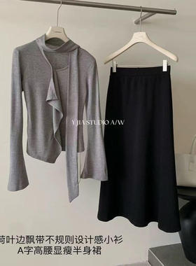 外贸折扣女装清仓特价韩系气质荷叶边飘带不规则修身显瘦内搭上衣