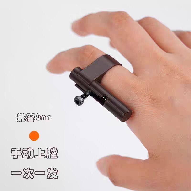 网红爆款迷你小玩具指环小手枪指尖解压神器按压发射儿童对战玩具图片