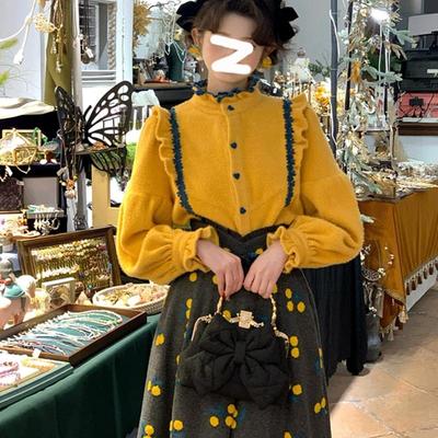 宽松显瘦复古单排扣长袖棉黄衬衫