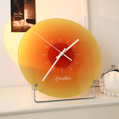 北欧落日挂钟网红ins轻奢现代简约客厅玄关装 饰品圆形免打孔时钟