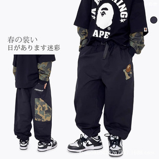 日系儿童工装裤2025新款卡通猿猴印花男女童裤子源头工厂现货