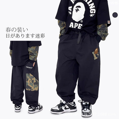 日系儿童工装裤2025新款卡通猿猴印花男女童裤子源头工厂现货