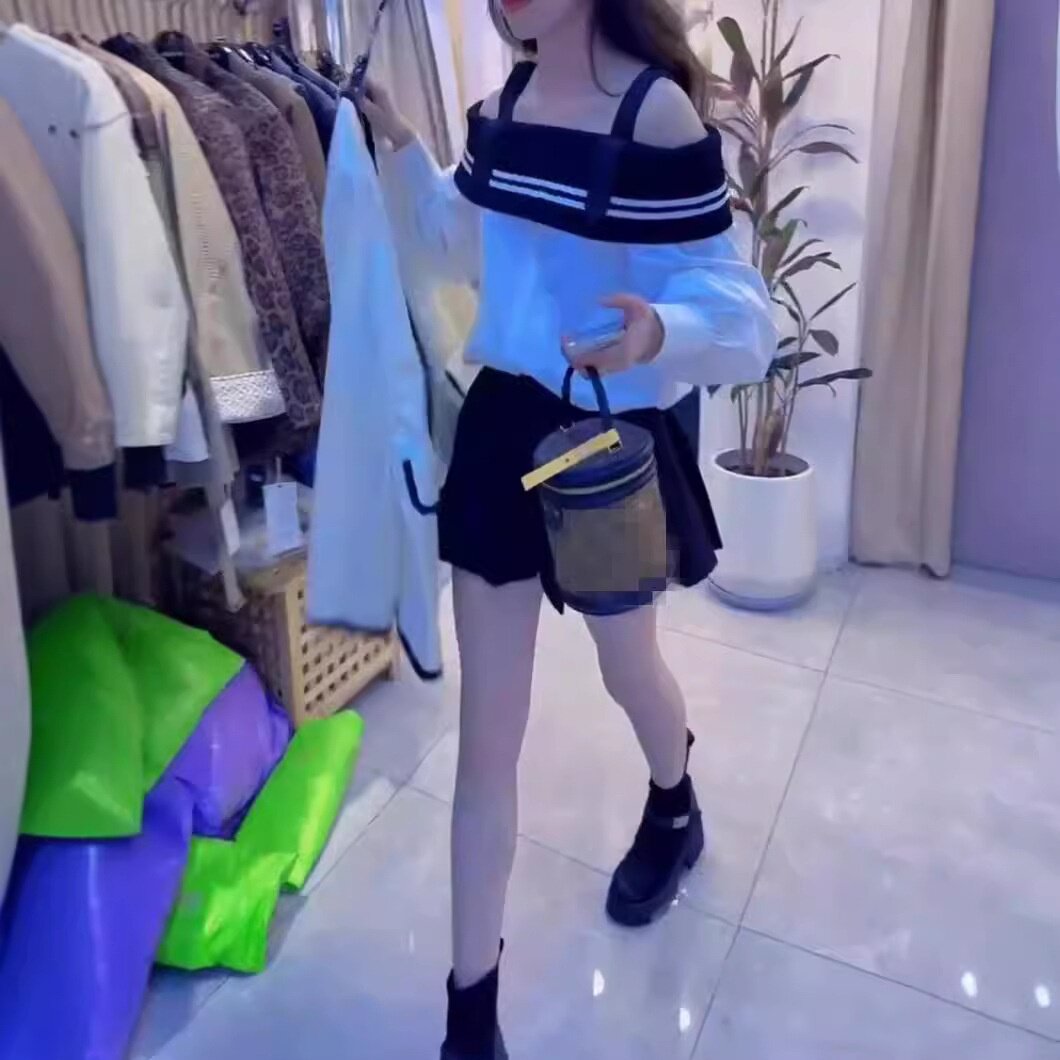 24959大爱美依缘2026新款纯欲风一字肩长袖上衣百褶短裙洋气女潮