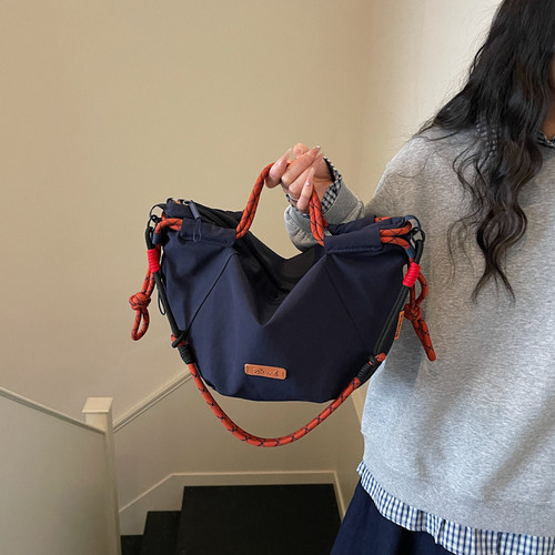 牛津布包包女高级感小众轻便休闲运动手提单肩斜挎包女通勤饺子包