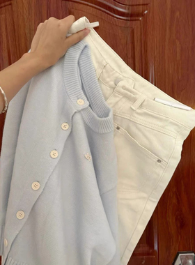 大牌衣服捡漏尾货清仓浅蓝色圆领针织开衫毛衣女短款纽扣外套软糯
