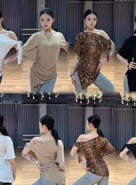 傲睨舞服新款拉丁舞服夏季斜肩绑带收腰修身款不规则罩衫Q118