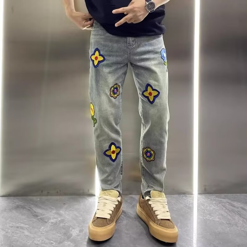 网红同款美式花瓣刺绣个性直筒牛仔裤男士社会欧洲站轻奢长裤子潮