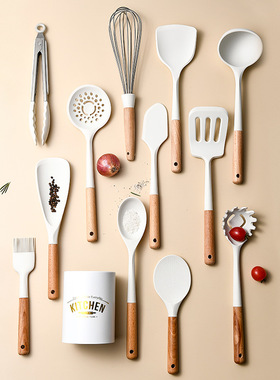 12-piece set of wooden-handled white silicone kitchen utensi