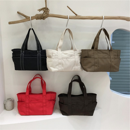 小脏柜 韩版帆布手提包2025新款上班通勤简约斜挎包大容量托特包