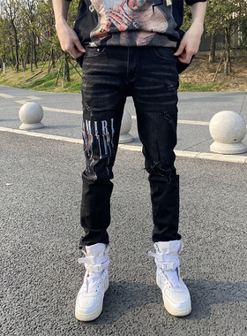 AMR新款欧美潮牌黑色大LOGO印花破洞牛仔裤男弹力修身小脚裤子潮
