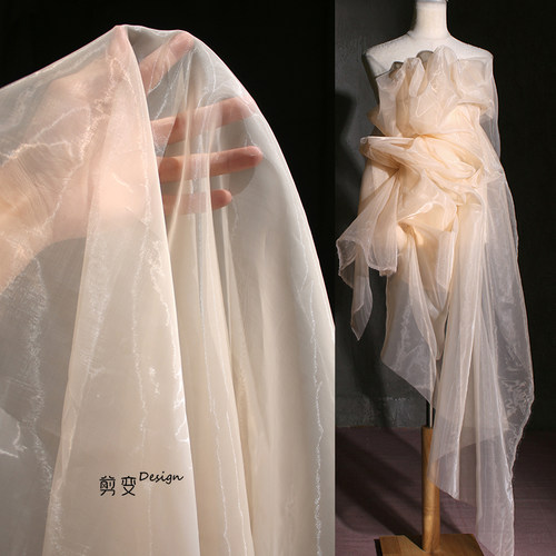 橘色欧根纱布料水光裙子服装面料