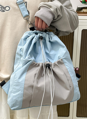小众设计韩系休闲背包包女蓝灰色抽绳双肩包斜挎包上课通勤小书包