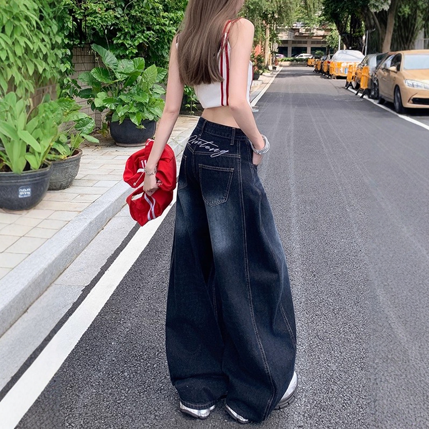 美式复古刺绣弯刀牛仔裤女秋季2025新款高腰阔腿宽松直筒镰刀裤子