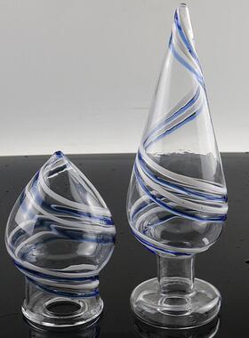 A self-pleasuring toy made of glass for use inside the anus.
