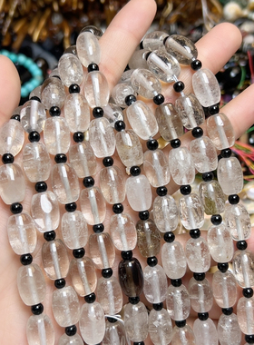 K388 处理9*13mm天然白茶混搭枣珠一条