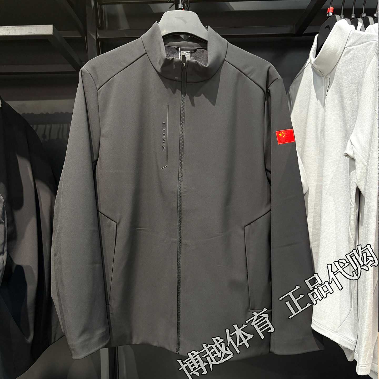 安踏综训系列男服2026冬季新款立领夹克轻暖绒梭织外套152647612N