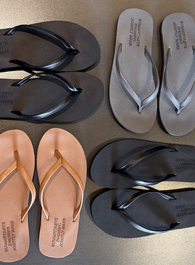 男士夹脚凉拖鞋黑色pu皮情侣外穿时尚沙滩度假网红平底人字拖鞋女