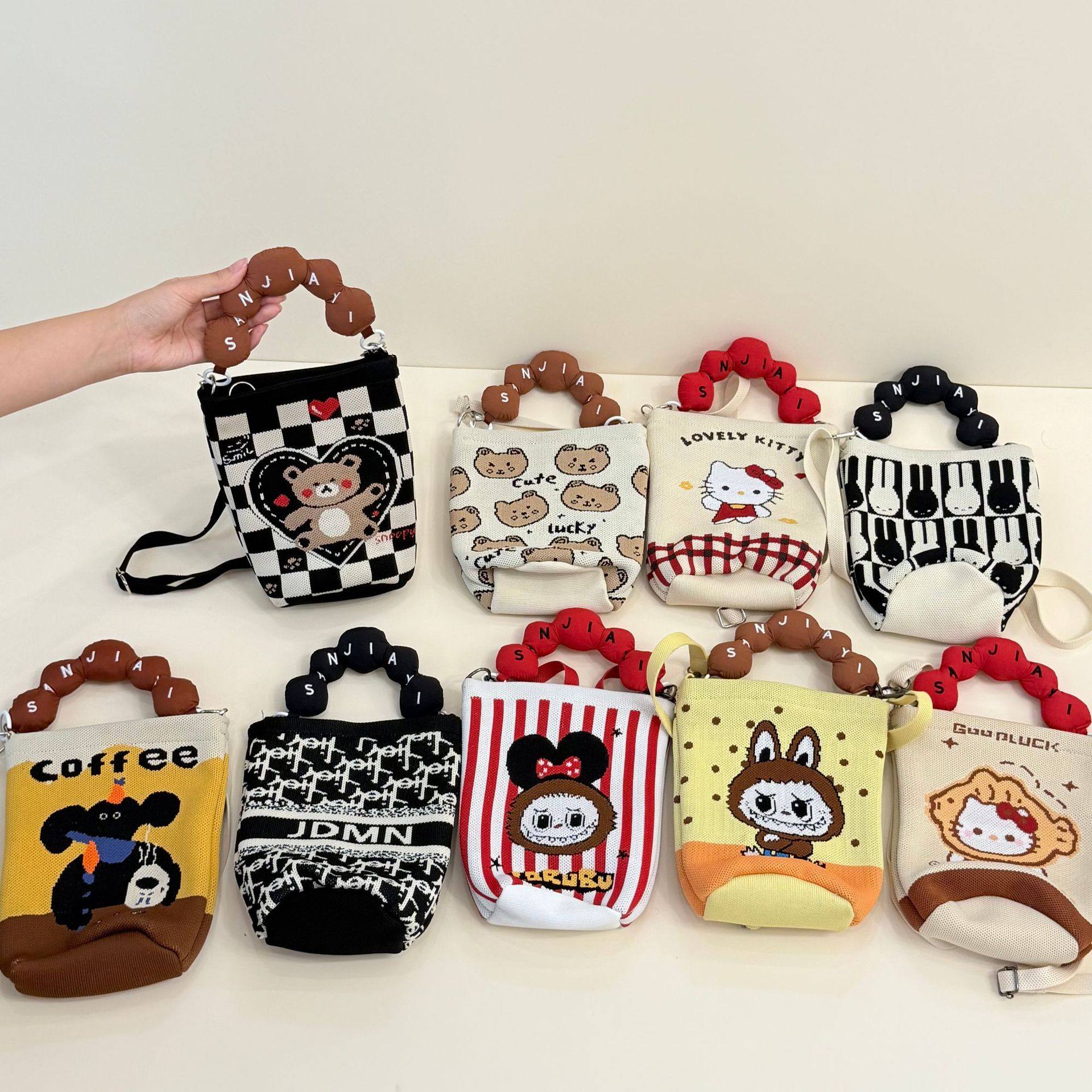 2025韩版新款ins手柄手提包时尚针织斜挎包出游百搭大容量水桶包,箱包皮具/热销女包/男包,水桶包,淘宝优惠券,粉丝福利购,淘宝优惠卷