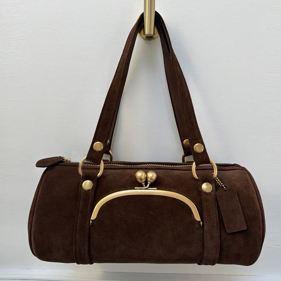 仿鹿皮绒磨砂圆筒形夹子包2026冬季欧美新款kisslock单肩腋下包