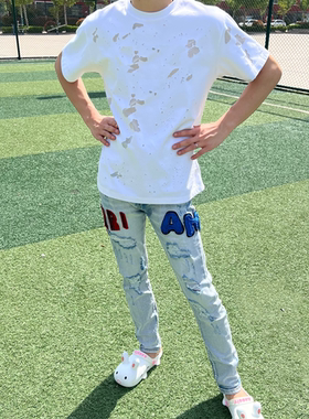 美式高街夏季透气新款牛仔裤红蓝BUFF双拼烫钻小脚裤刺绣潮牌长裤