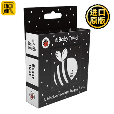 婴儿触摸一本黑白的马车书