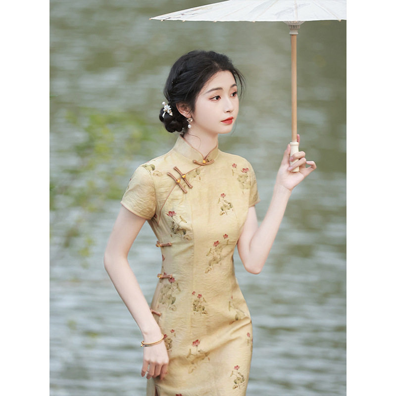 改良黄色旗袍2026新款年轻款少女新中式国风长款高端送考连衣裙夏