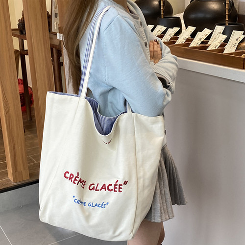 韩版正反双面条纹单肩包大容量托特包高级质感加厚刺绣学生帆布女